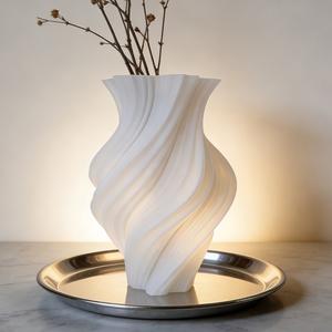 Este jarrón espiral elegante y artístico es perfecto para exhibir flores secas y se puede colocar sobre una mesa de centro o escritorio en la sala de estar para crear un ambiente festivo. Es un regalo o decoración ideal para las festividades.