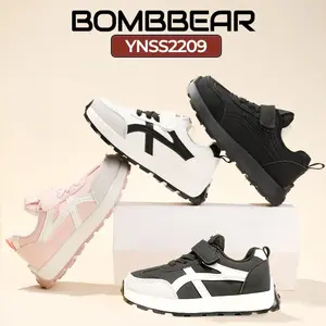 BOMBBEAR 2209 Sepatu Sekolah Anak Fashion Sneakers Bahan Strap Velcro Kulit Sintes Premium Kualitas Nyaman Lentur Ringan Desain Ergonomis untuk Aktivitas Aktif Si Kecil Warna All Black Black Putih Pink Size 26-37