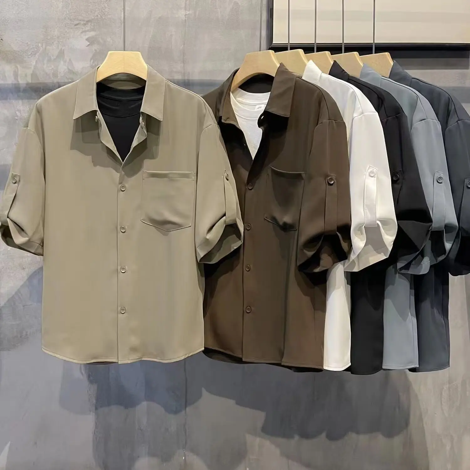 New men's high-end ice silk short sleeved shirt solid color breathable and versatile button top fashionable and handsome casual and handsome half sleeved men's clothing