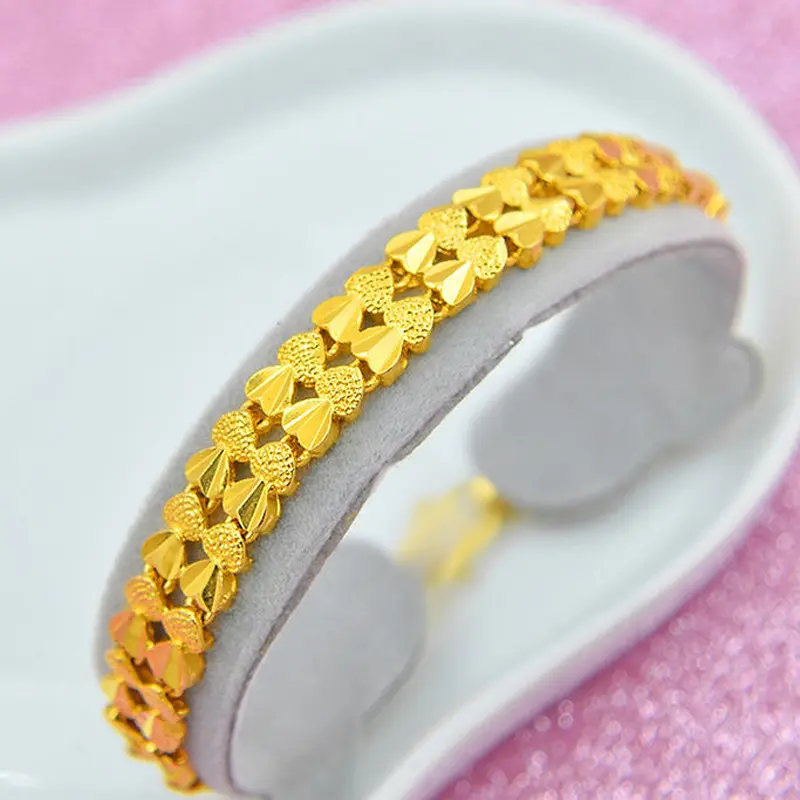 Alloy bracelet fashion Joker gold double-row heart bracelet ladies exquisite jewelry.